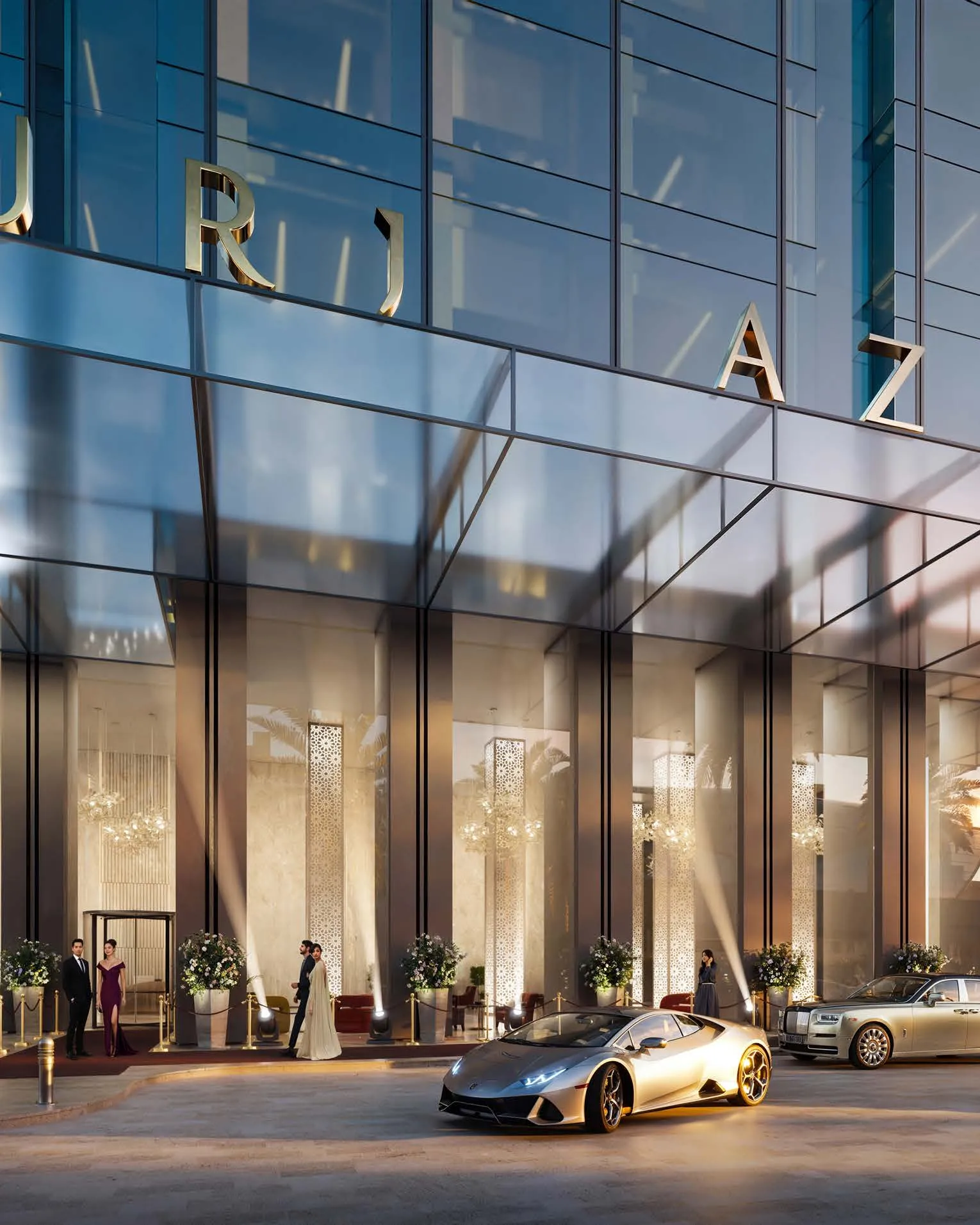 Glass entrance canopy of Burj Azizi at dusk, with cars at the drop-off